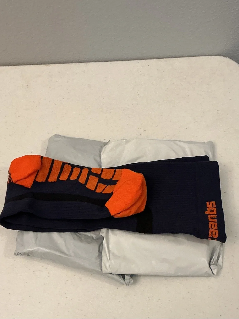 Squeezegear Performance Athletic Socks in Navy with Orange Accents